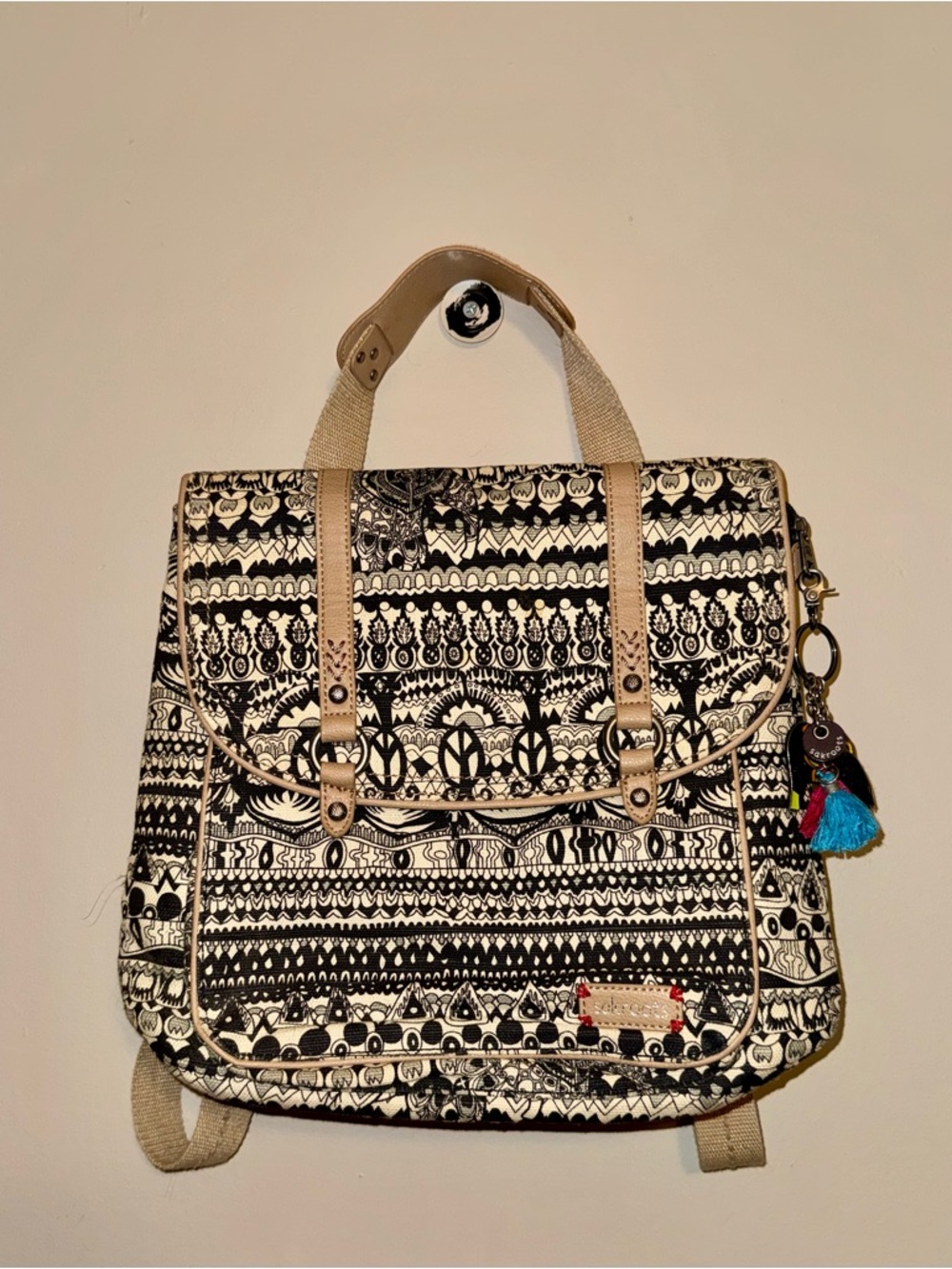 Sakroots Black and Cream Tribal-Print Canvas Backpack with Tassel Charm